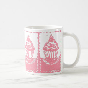 Café Magdalenas rosadas con la taza de la frontera de