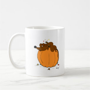 Café Mediodía durmiendo en una taza de calabaza