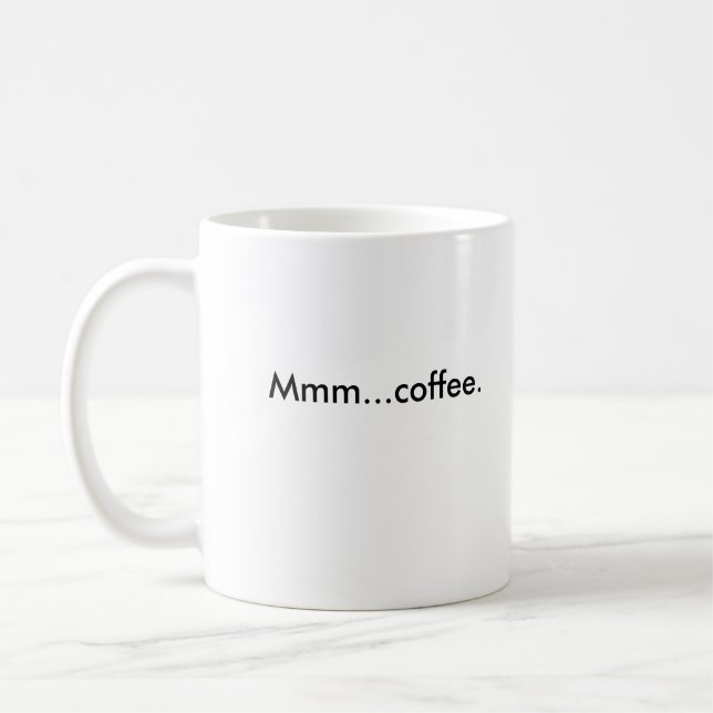 … Café Mmm. Taza de Nikki de la meta (Izquierda)