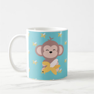 Café Mono lindo de Kawaii con la taza del plátano