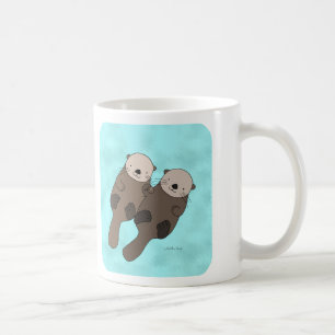 Café Nutria que sostiene la taza linda de los pares de