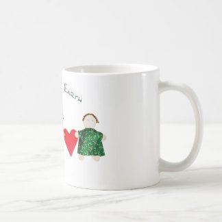 Café paz en la taza de la tierra