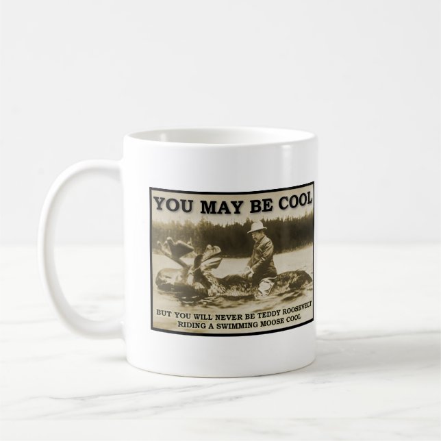 Café Peluche en una taza divertida de los alces (Izquierda)