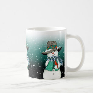 Café Snowman sonriente, cardenal en una taza de torment