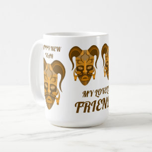 Café Taza con arte de máscara tradicional