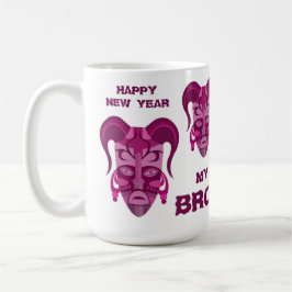 Café Taza con arte de máscara tradicional