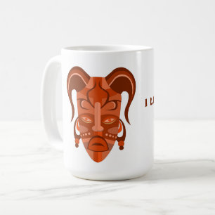 Café Taza con arte de máscara tradicional