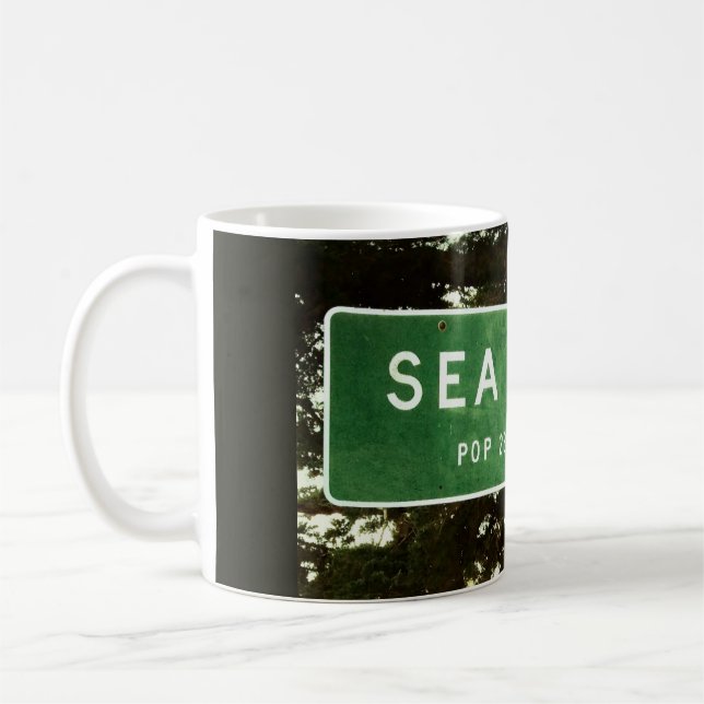 Café Taza con letrero icónico de Sea Ranch (Izquierda)