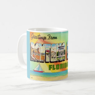 Café Taza con postal retro de Daytona Beach