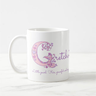 Café Taza conocida del monograma de G de la flor del