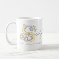 Taza conocida del monograma del significado de la