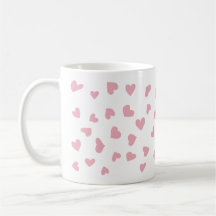 Taza de garabatos de corazón rosa dispersos