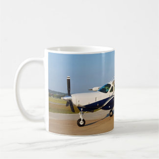 Café Taza de la caravana de Cessna 208