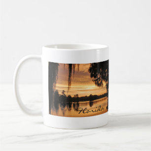 Café Taza de la Florida de la puesta del sol del río d