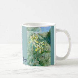 Café Taza de la primavera con veris del Primula de