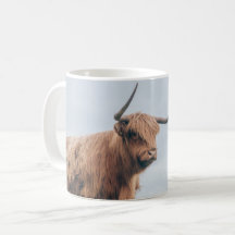 Taza de la vaca de la montaña de "Angus"