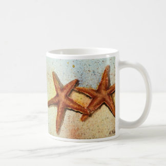 Café taza de las estrellas de mar