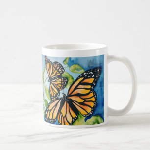 Café taza de las mariposas de monarca