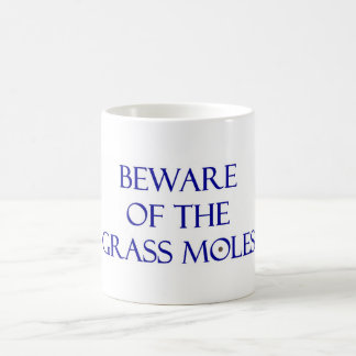 Café Taza de los topos de la hierba