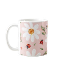 Taza de mariquita linda y flor blanca