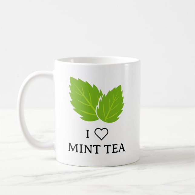 Café Taza de té de menta con logo de hojas de hierba ve (Izquierda)