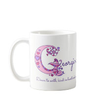 Taza decorativa del monograma de G del significado