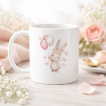 Taza del conejo de Pascua con globos pastel