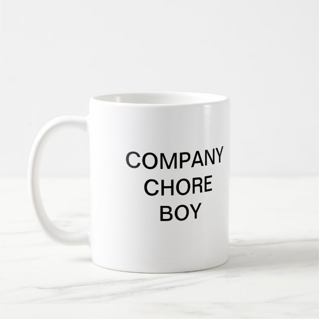 Café Taza del muchacho de la tarea (Izquierda)