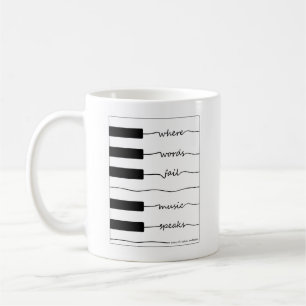 Café Taza del teclado de piano con cita inspiradora