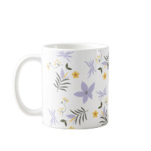 Taza floral suave de púrpura y amarillo