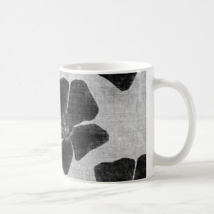 Café Taza negra del estampado de plores