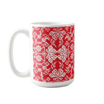 Taza roja acogedora del día de fiesta