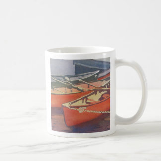 Café taza roja de las canoas