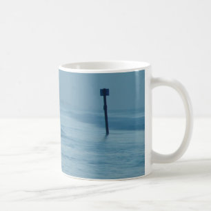 Café Taza solitaria de la marea de la playa de FL de la