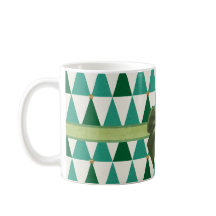 Taza verde dulce del navidad de la chispa