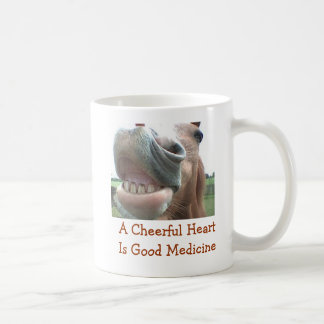 Café Un corazón alegre es buena taza de la medicina