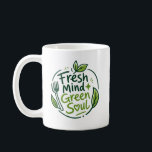 Café Una taza de mente fresca<br><div class="desc">Un logotipo fresco e inspirado en el medio ambiente que presenta una taza estilizada llena de elementos frondosos, simbolizando la nutrición tanto para el cuerpo como para la mente. El eslogan “Mente Fresca, Alma Verde” está integrado en un estilo suave y dibujado a mano alrededor o dentro de la taza,...</div>