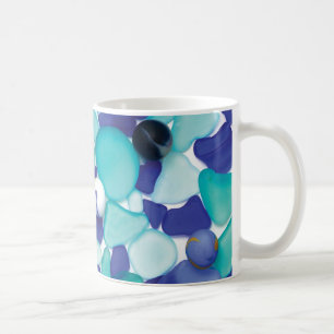 Café Vidrio del mar y taza azules de los mármoles del