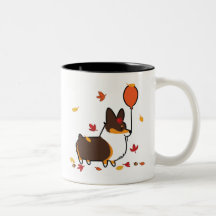 Caída tricolora del Corgi en la taza el |
