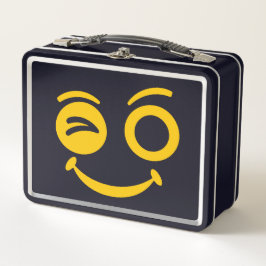 Caja de comida metálica con cara sonriente guiñand