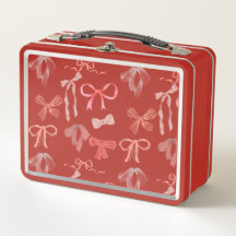 Caja de metal con lazos rojos