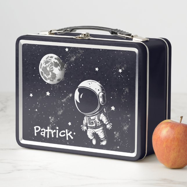 Caja de metal divertida de astronauta en el espaci (In situ)
