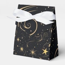 Caja de regalo de las estrellas doradas con cinta