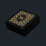 Caja De Regalo Patrón elegante de hojas de oro negro de lujo<br><div class="desc">Dale a tu ser querido un toque de clase con este elegante diseño de hojas de oro y monograma negro. Este producto presenta un patrón de hojas de oro de bonito con un toque vintage. Personalice con la letra monograma que elija. Es una caja de regalo perfecta para poner tus...</div>