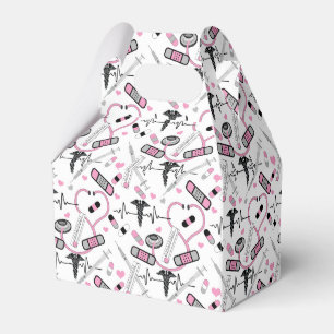 Caja para regalos con objetos médicos rosa y blan