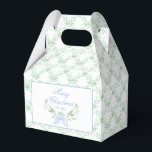 Caja Para Regalos Feliz estribillo navideño y bribón azul<br><div class="desc">Esta caja de favores de la moda presenta un diseño de Navidades del milenio con una franja azul y verde con un arco azul con el texto que dice "Feliz Navidad para ti". El fondo está decorado en tonos azules y verdes.</div>