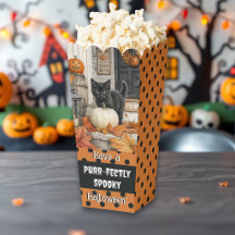 Gato negro de granja y calabaza de Halloween