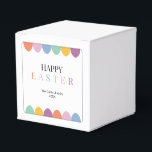 Caja Para Regalos Personalizado Feliz Pascua Colorida Simple Moderno<br><div class="desc">Las cajas personalizadas Happy Easter Colorful Simple Modern Favor Boxes presentan un fondo blanco con un diseño alegre y colorido. La parte delantera muestra un texto moderno "EASTER" en colores elegantes y vibrantes, junto con huevos de Pascua ilustrados. Una delgada línea de esquina redondeada enmarca el diseño, añadiendo un toque...</div>