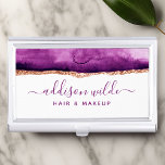 Caja Para Tarjetas De Visita Abstracto De Color Púrpura Y Oro<br><div class="desc">Destacar entre la multitud con nuestro funda abstracto de tarjetas de visita color púrpura y acuarela dorada. El impresionante diseño acuático presenta una mezcla de violetas profundas y dorados ricos que crean un ambiente sofisticado y elegante, perfecto para cualquier profesional de negocios. Personalizar tu diseño con tu propia información personal,...</div>