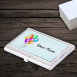 Caja Para Tarjetas De Visita Brillante y colorida manada de globos de streaming<br><div class="desc">Este funda de tarjetas de visita de plata es azul claro con un montón de globos coloridos y brillantes en blanco amarillento,  naranja,  azul,  verde,  morado y bruja rosa que cuelgan de las mismas. Personalizar tu nombre con la plantilla.</div>